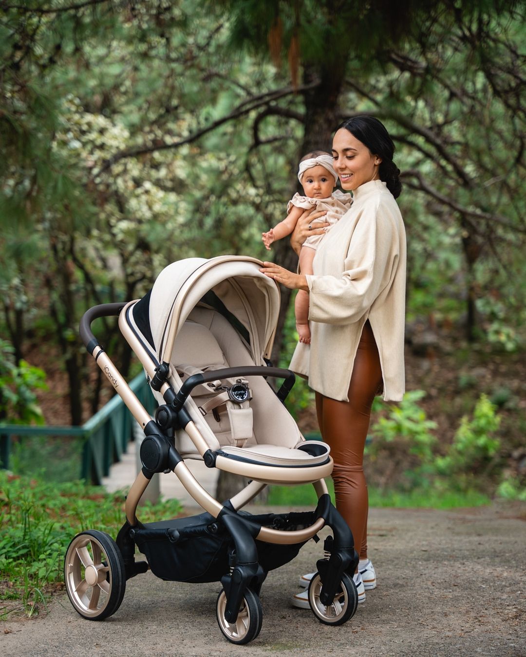 mother and baby with icandy travel system