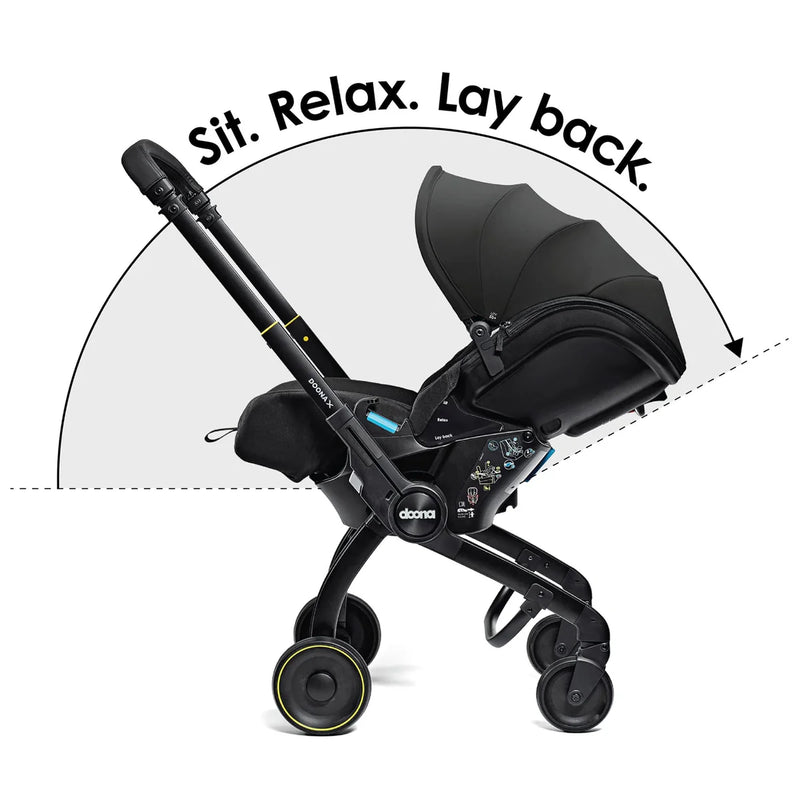 Doona X Recline Car Seat & Stroller with Isofix Base & Rain Cover Bundle - Nitro Black + FREE Essentials Bag Worth £54.99!