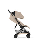 Cybex COŸA Comfort + Foldable Carrycot Matt Black - Cozy Beige (2026 Model)