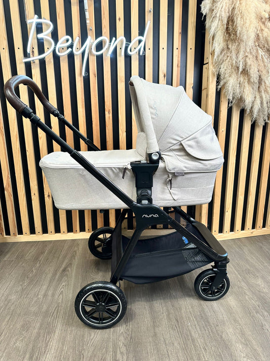 PRE LOVED Nuna Triv Travel System - Biscotti