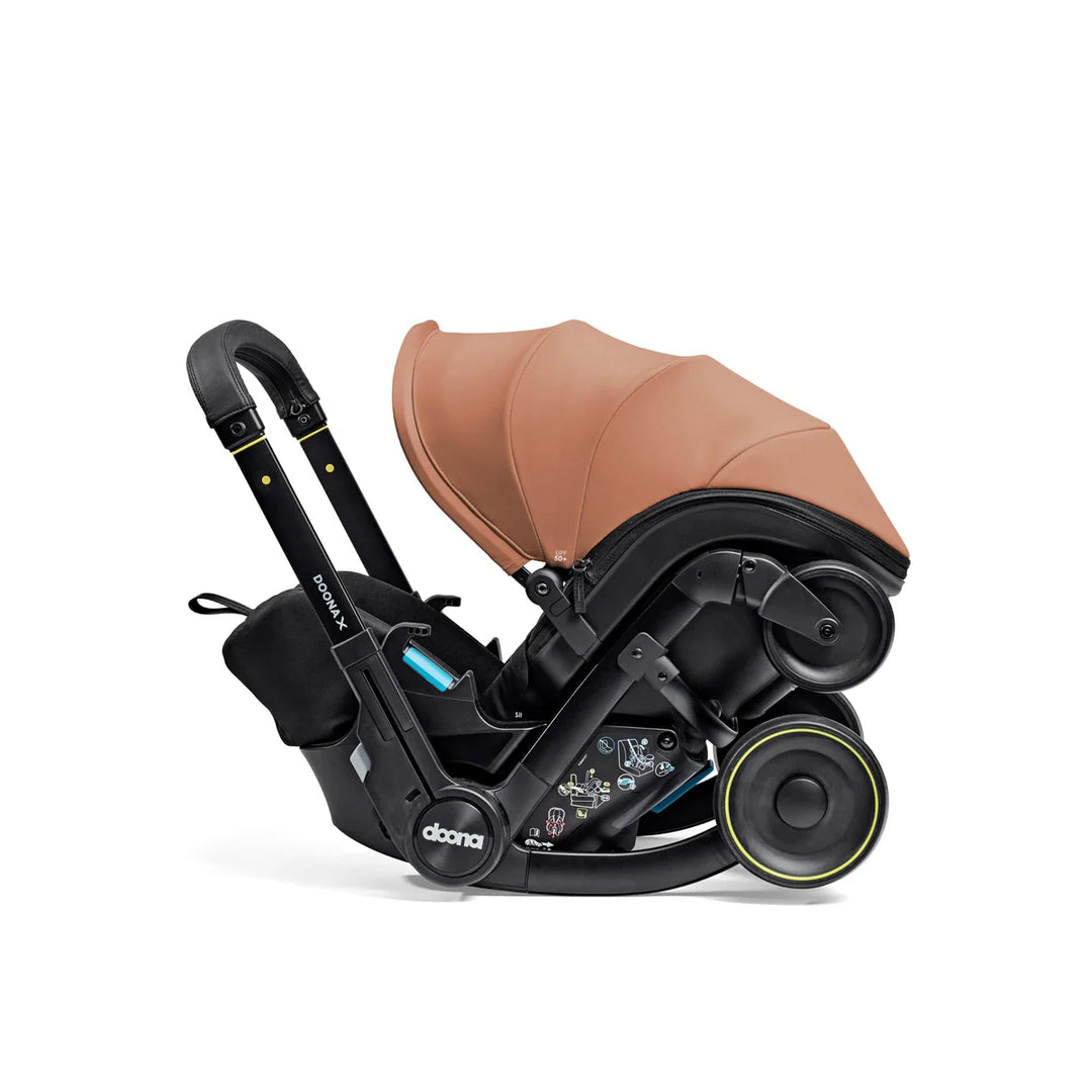 Doona X Car Seat & Stroller - Terracotta + FREE Essentials Bag