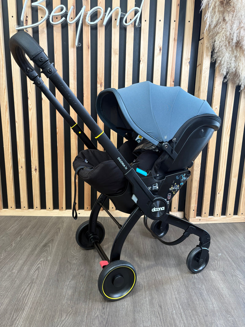 PRE LOVED Doona X Car Seat & Stroller w/ Rain Cover - Ocean Blue