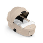 Cybex COŸA Comfort + Foldable Carrycot Matt Black - Cozy Beige (2026 Model)
