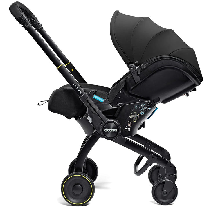 Doona X Recline Car Seat & Stroller with Isofix Base & Rain Cover Bundle - Nitro Black