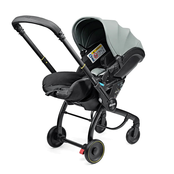 Doona X Car Seat & Stroller - Dusty Sage + FREE Essentials Bag Worth £54.99!