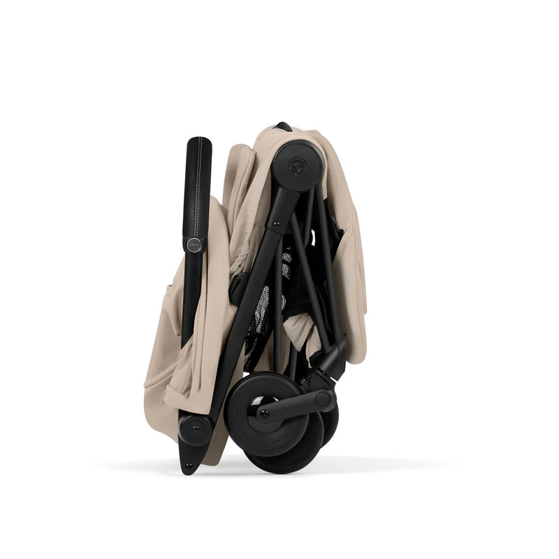 Cybex COŸA Comfort + Foldable Carrycot Matt Black - Cozy Beige (2026 Model)
