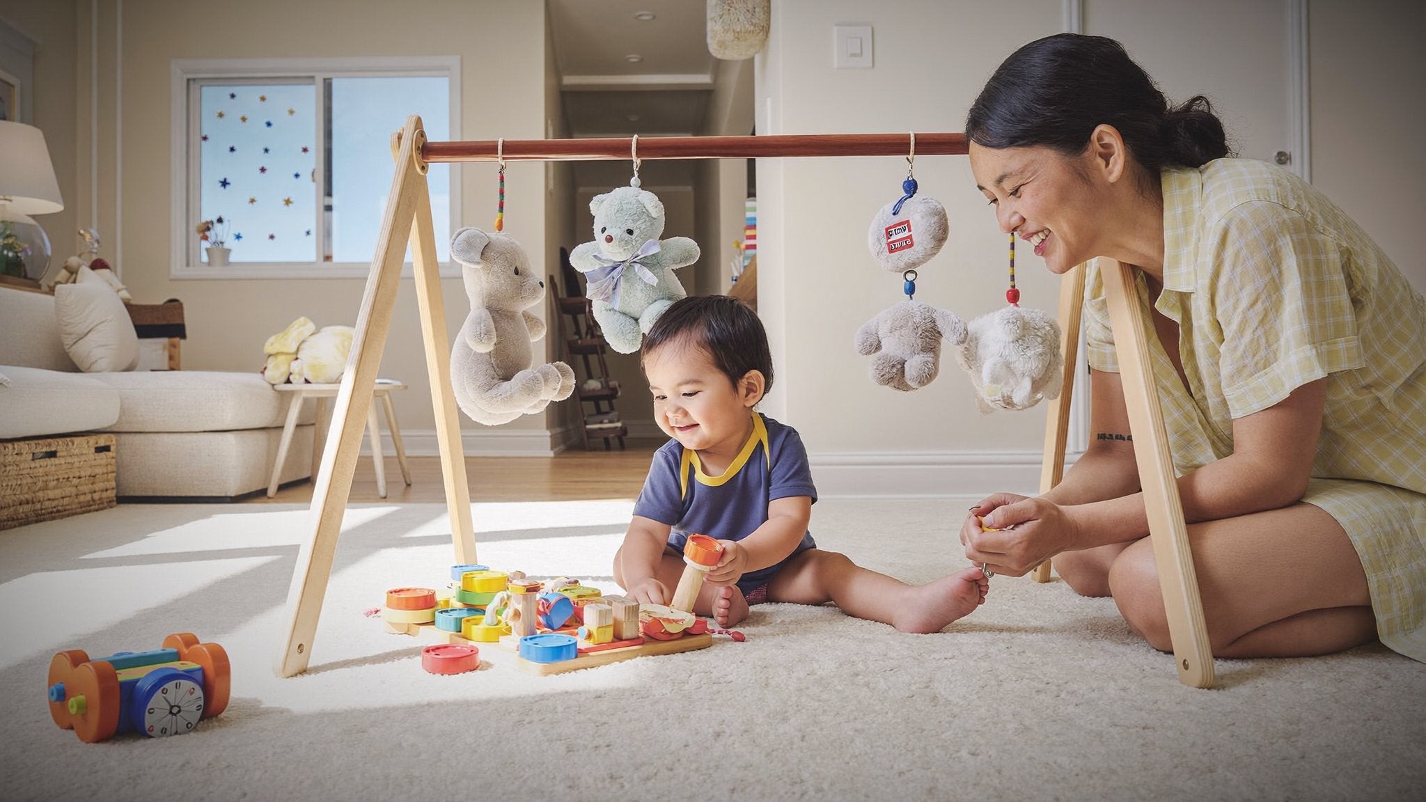 Toddler playing under a wooden play gym with mum - Bambinos & Beyond Playtime & Activities