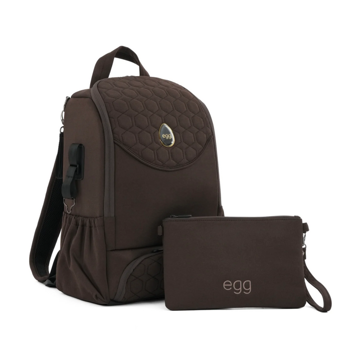 Brown backpack and matching pouch with 'egg' branding on a white background