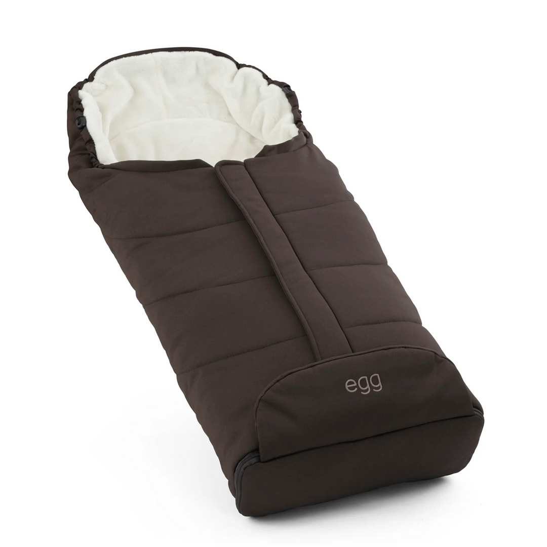 Brown baby footmuff with white interior on a white background
