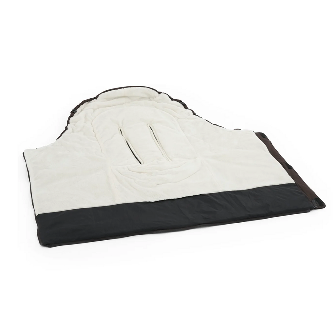 White and black quilted blanket on a white background