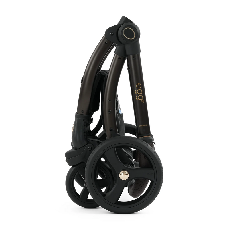 Black egg scooter folded on a white background