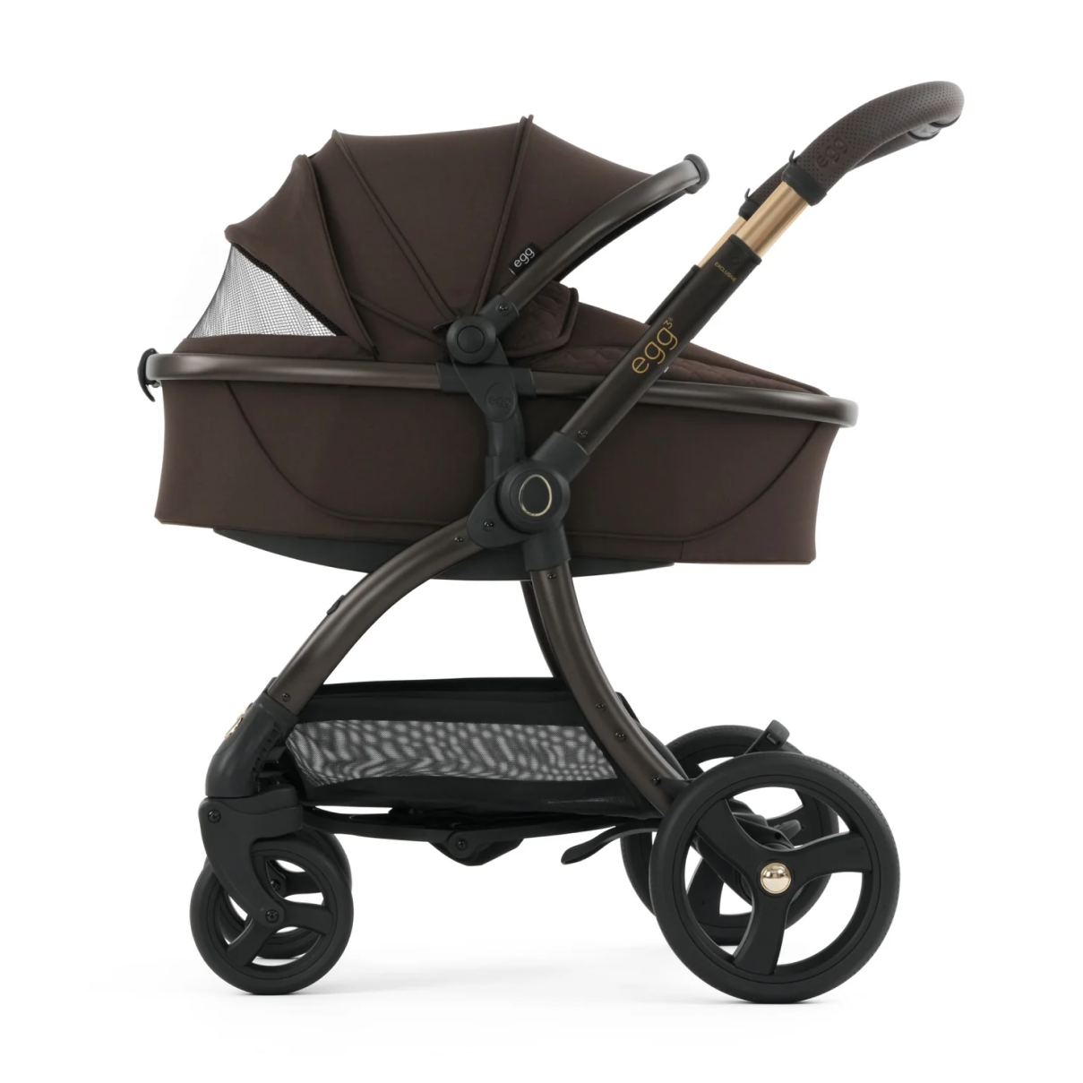 Brown baby stroller on a white background
