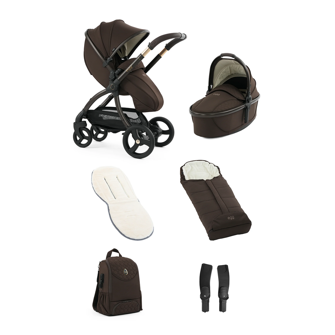 Collection of brown baby stroller accessories on a white background